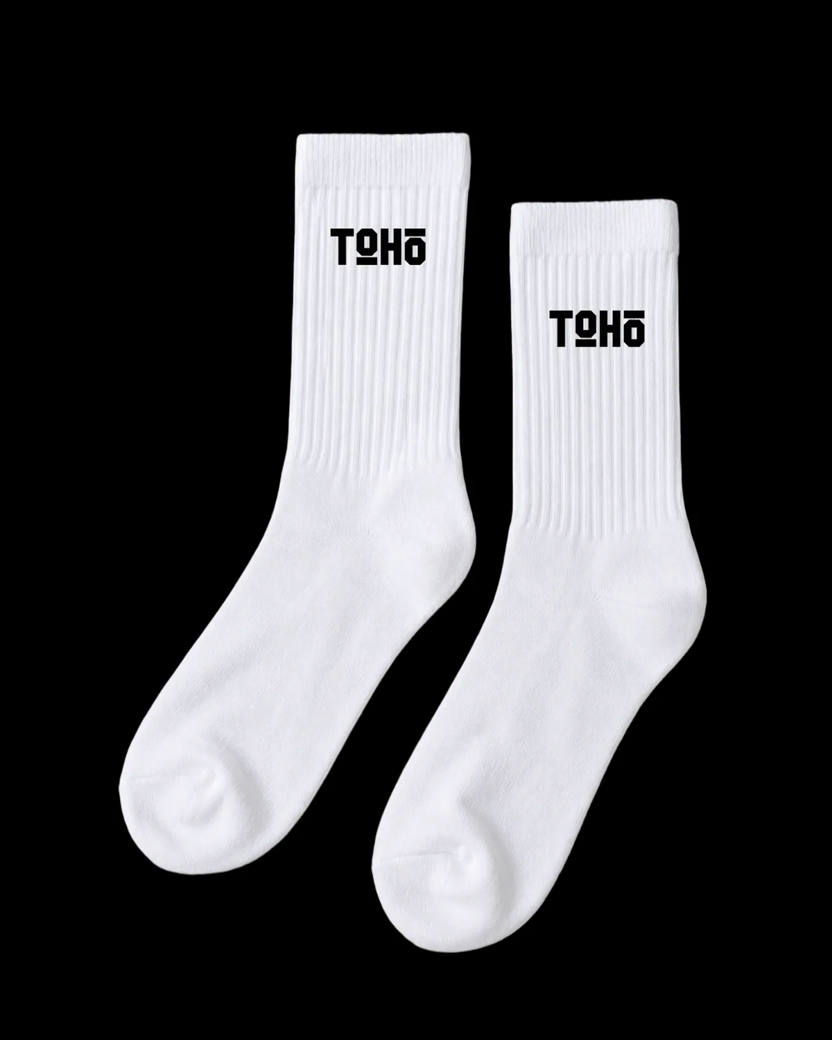 White TOHO wordmark socks.